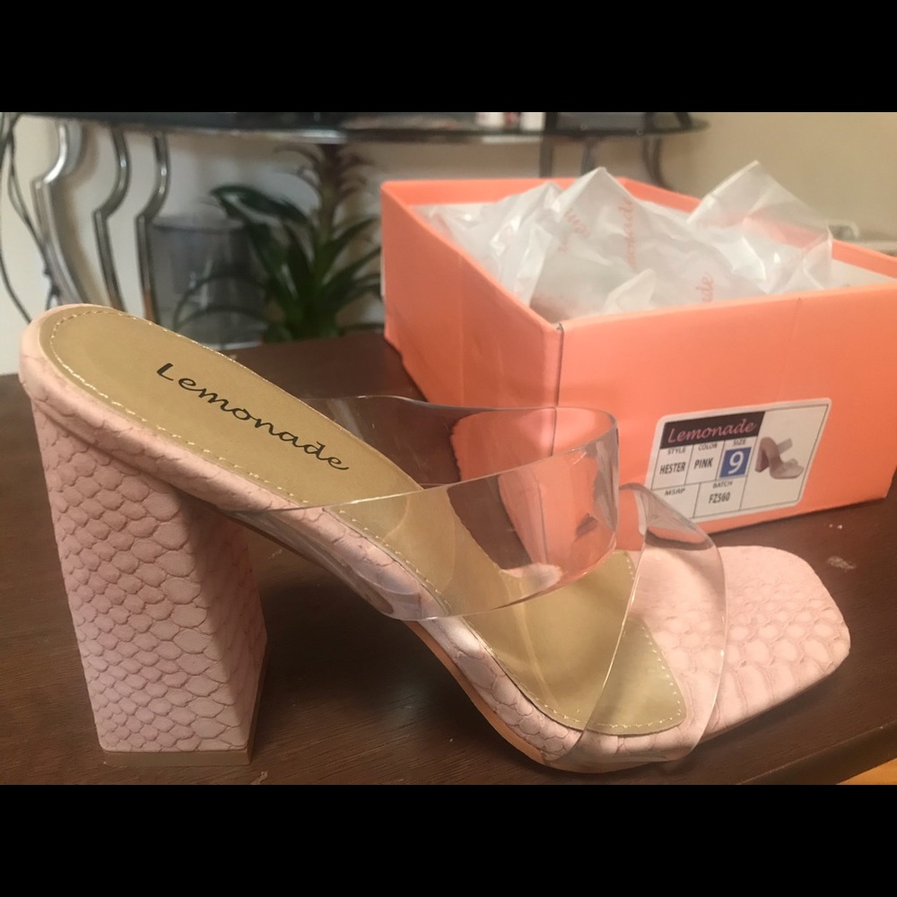 Pink bottom lucite strap heels